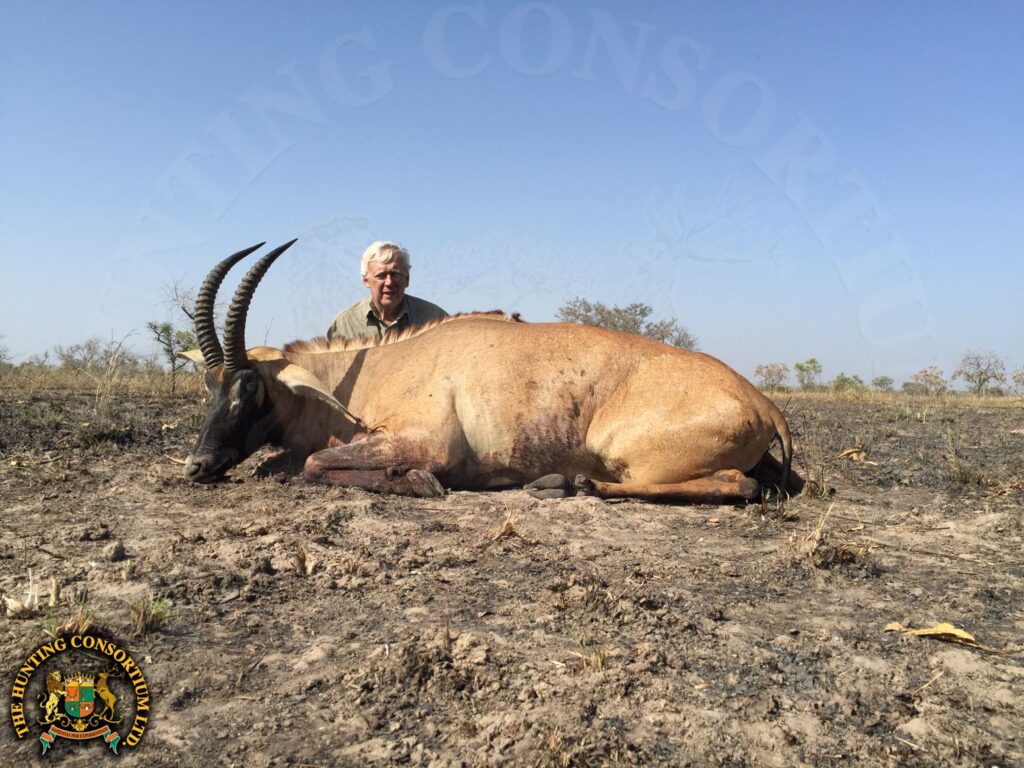 Photo of our client with his Western Roan Hunting. Western Roan Hunting in Africa. Roan Hunts in Africa.
