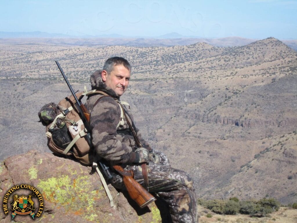 Hunter hunting in the mountains of West Texas