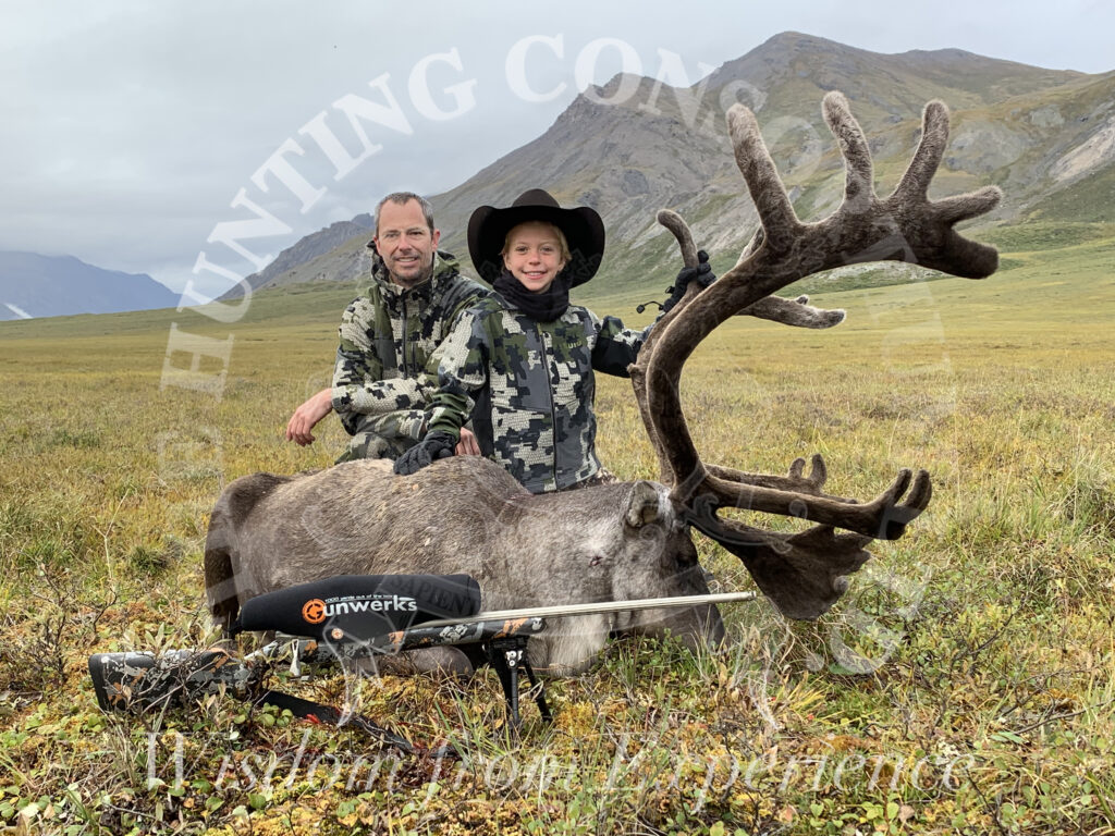 Image of youngest female grand slam winner with Barren Ground Caribou in Alaska during Common Grizzly Bear Hunting